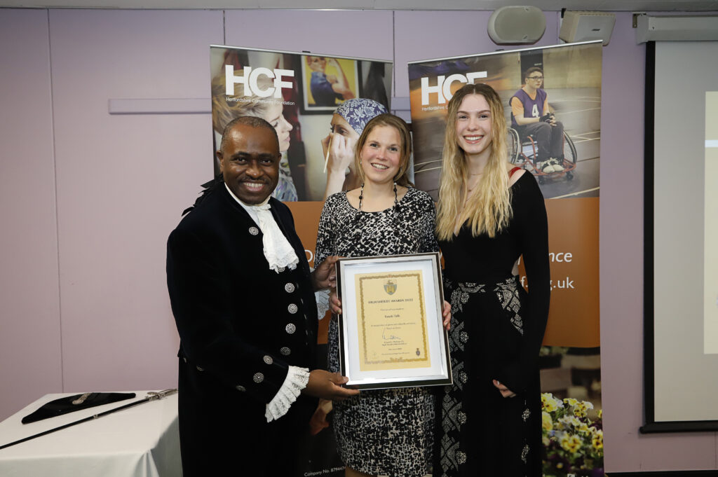 Rachel, Rosie and Lionel Wallace with Youth Talk's High Sherriff's Award.