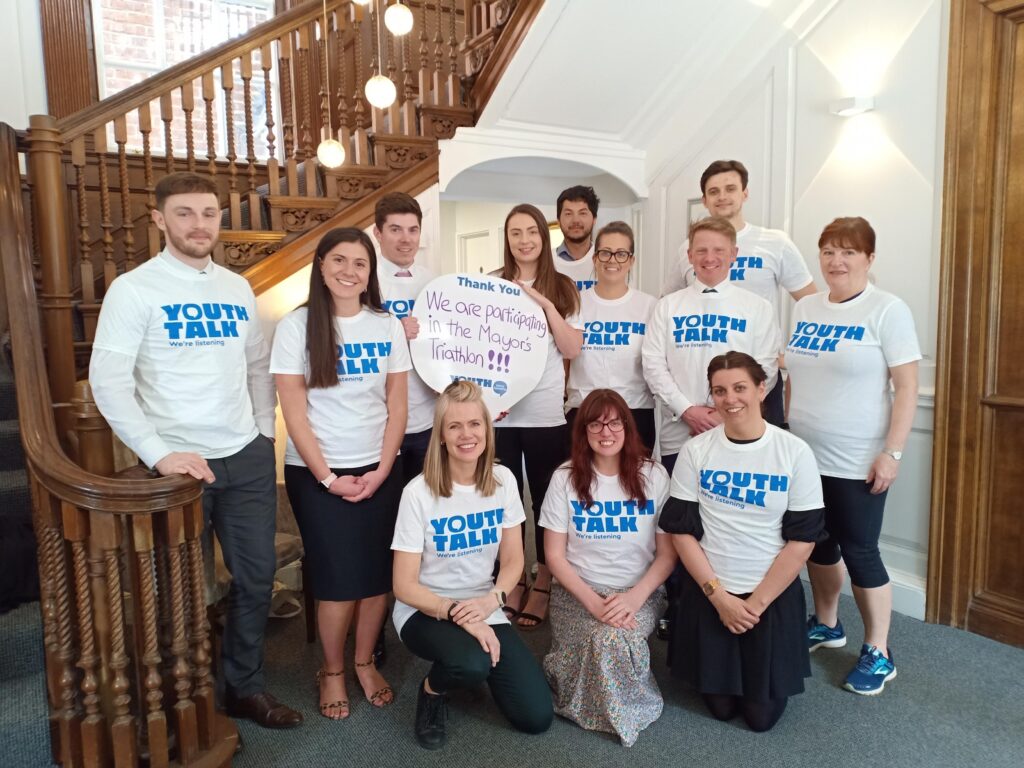 The Debenhams Ottaway team wearing Youth Talk vests