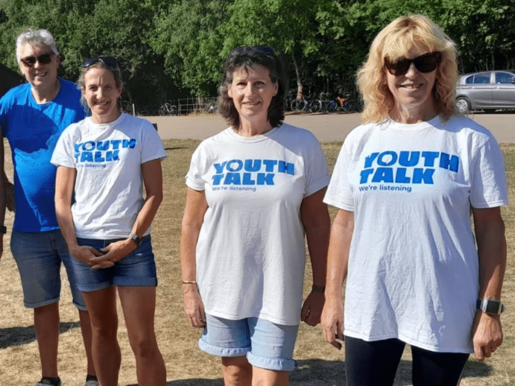 Our St Albans 10k volunteers smiling in Youth Talk t-shirts.